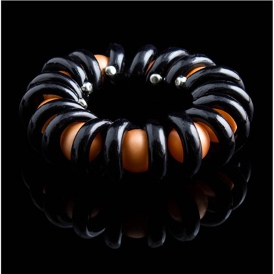Резинка-пружинка для волос с матовыми бусинами " KRA-2242 " черный/оранжевый